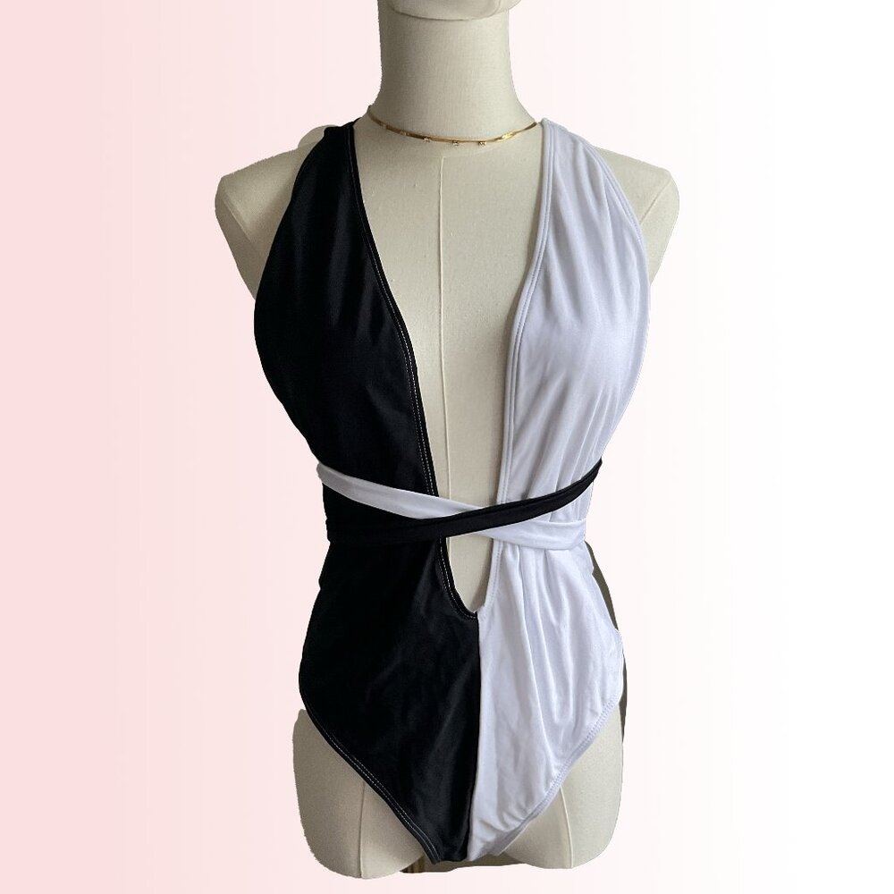 Split black and white strappy one piece swimsuit NWOT